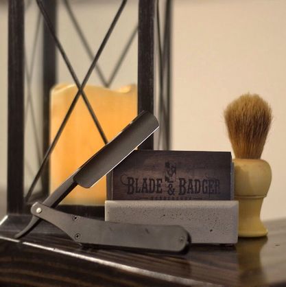Blade and Badger Basbershop logo business cards with shaving razor and badger fur brush for straight shaves.